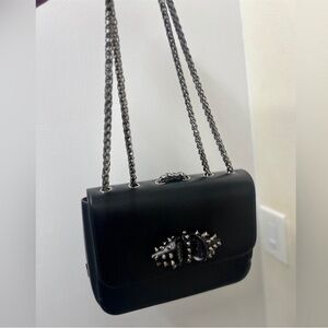 Christian louboutin small charity bag